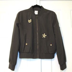 olive green bomber jacket with gold patches